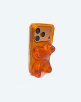 Orange gummy bear-shaped phone case on a white background