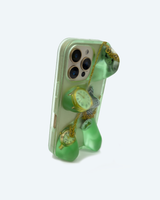 Green phone case with decorative elements on a white background