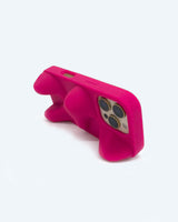 Pink sculptural phone case on its side