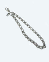 Silver wristlet on a white background