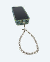 silver wristlet attached to phone