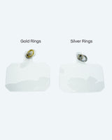 two clear connector tabs with a gold and silver ring on white background