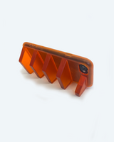 orange phone case standing sideways to watch and stream