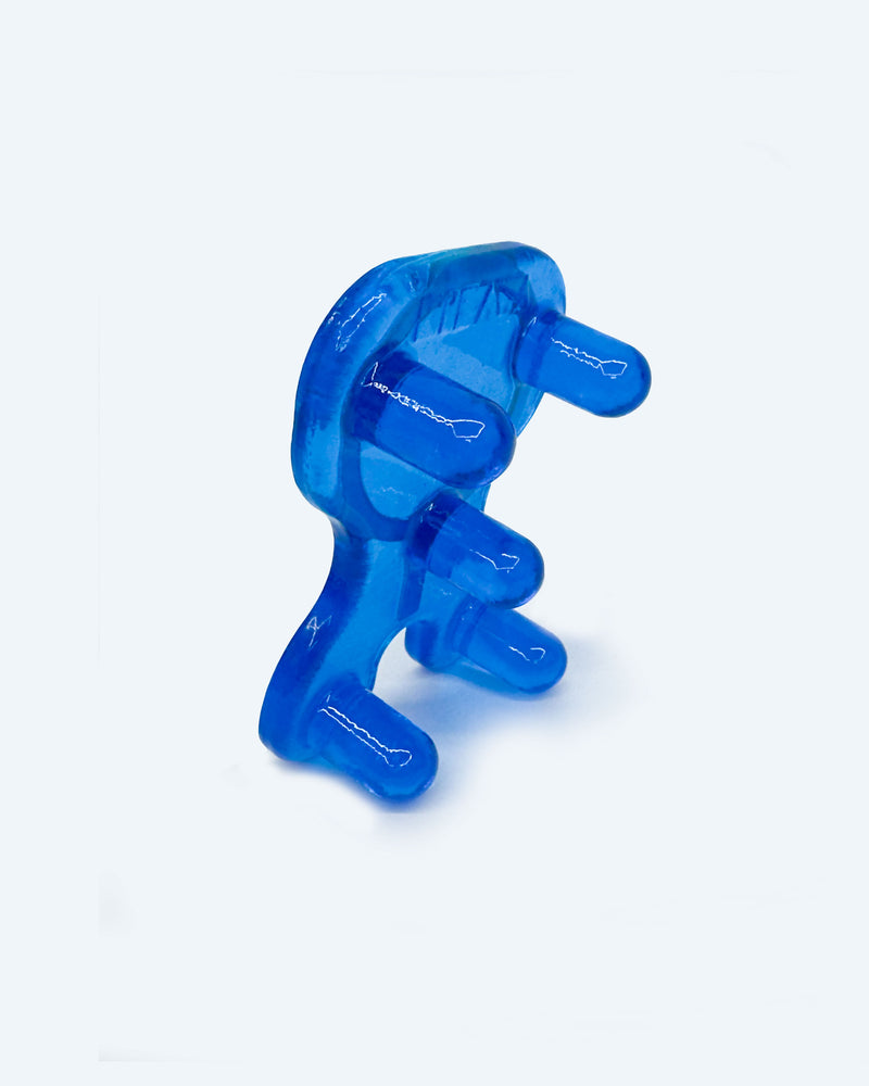 Blue plastic tool on a light gray background