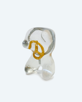 Clear magsafe accessory with pretzel inside on a white background