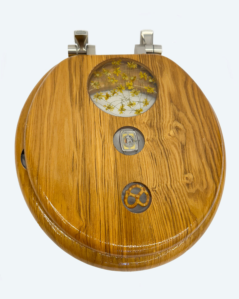 Pretzels and Watches Collage Experiment in Round Wooden Toilet Seat